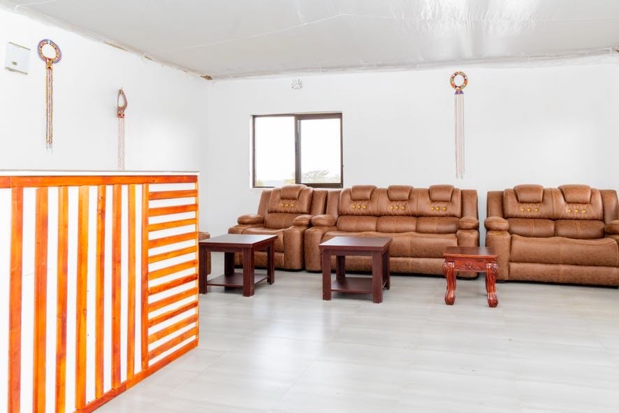 Relaxed seating in the camp lounge overlooking the Maasai Mara