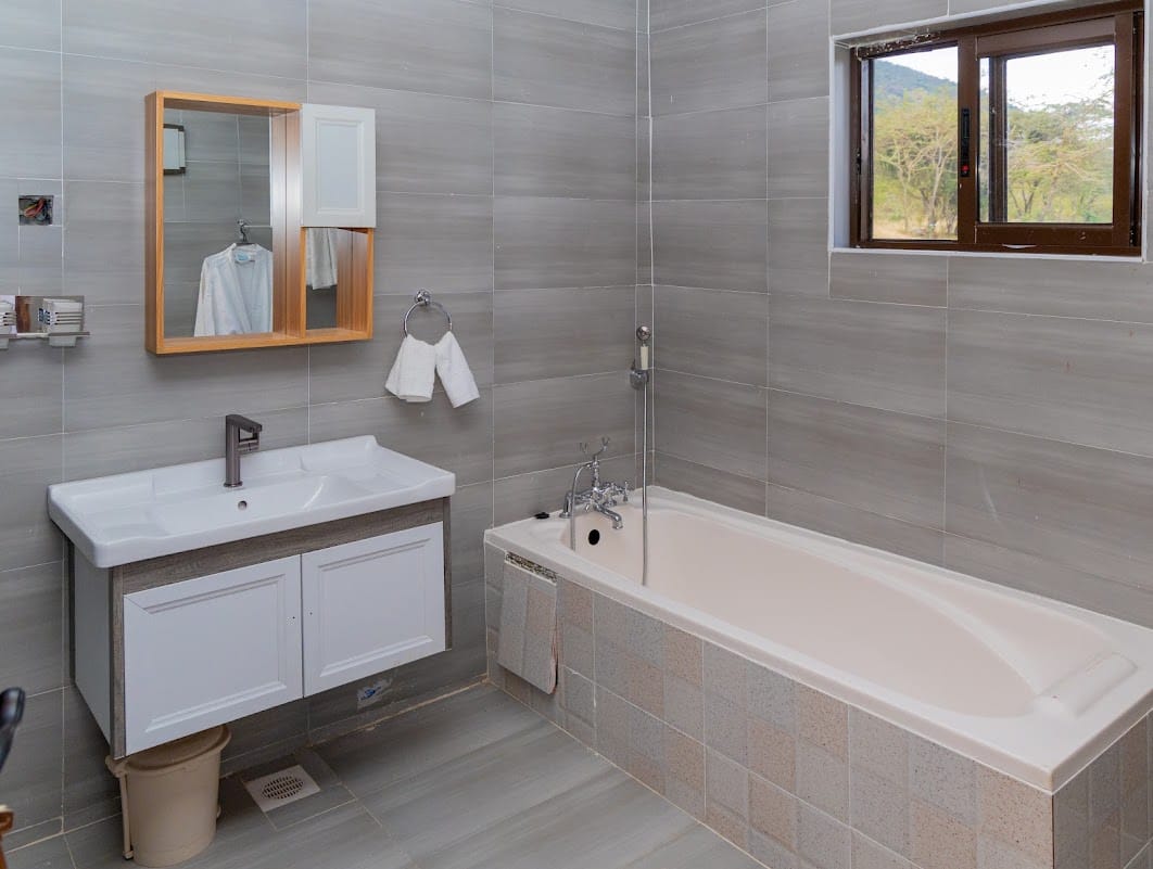 Guest tent dressing space, bathroom, and polished interiors