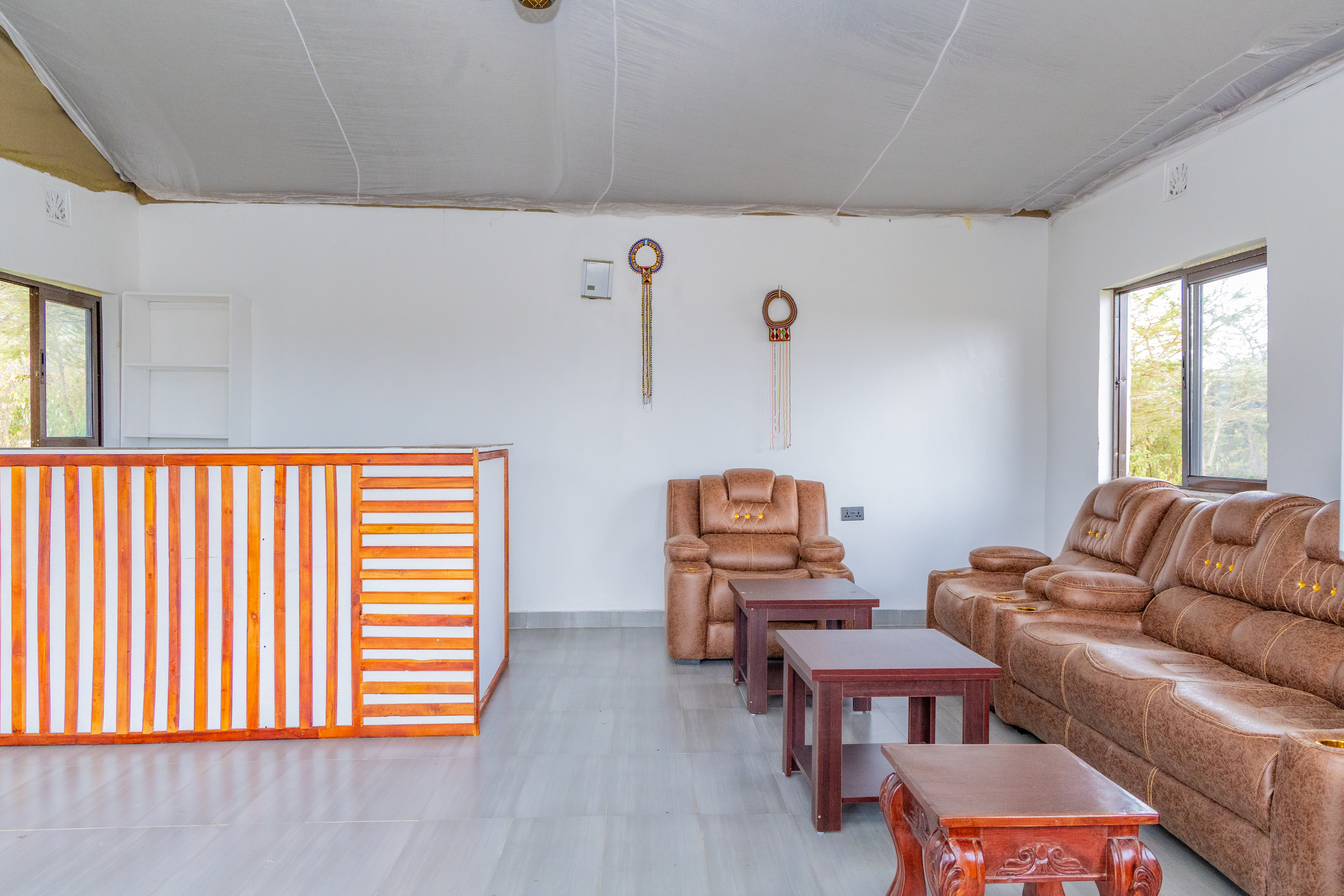 Warm lounge and reception welcome at Oltukai Mara Camp